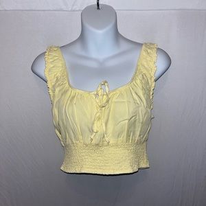 yellow tank top